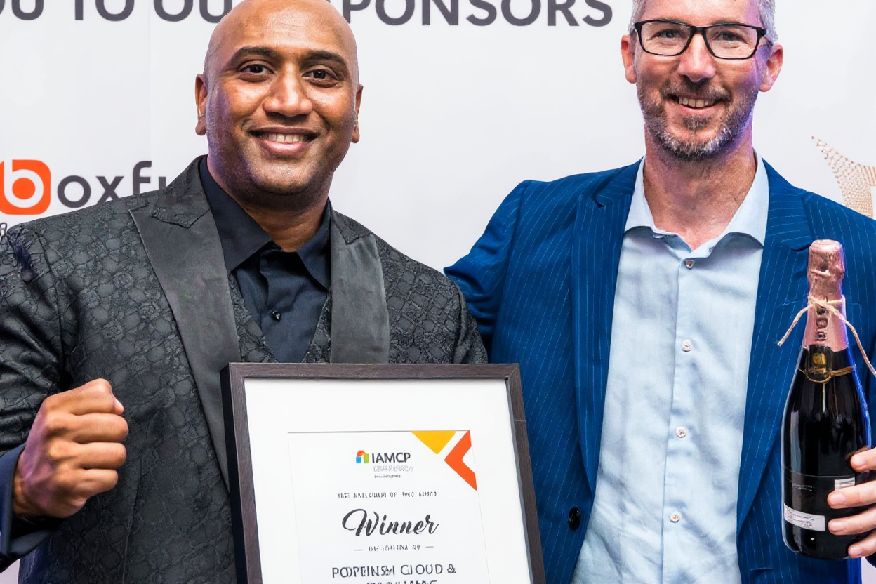 CEO Pranavan Chetty accepting IAMCP award